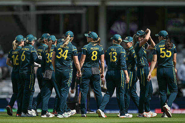Australia leave the pitch at the break after 20 overs during the ICC Women's T20 cricket world cup 2026 semi-final game between Australia and West...