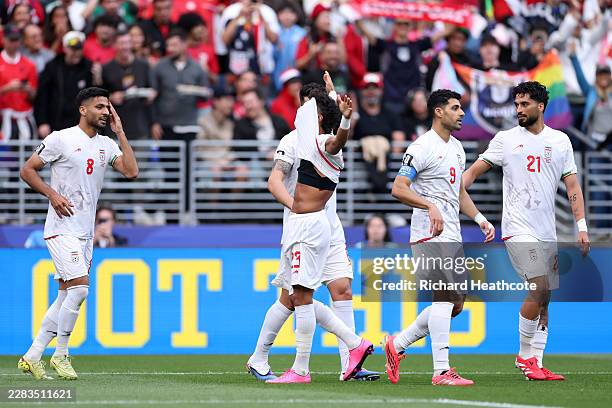 Ramin Rezaeian of IR Iran celebrates scoring his team's first goal during the FIFA World Cup 2026 Group G match between Egypt and IR Iran at Seattle...