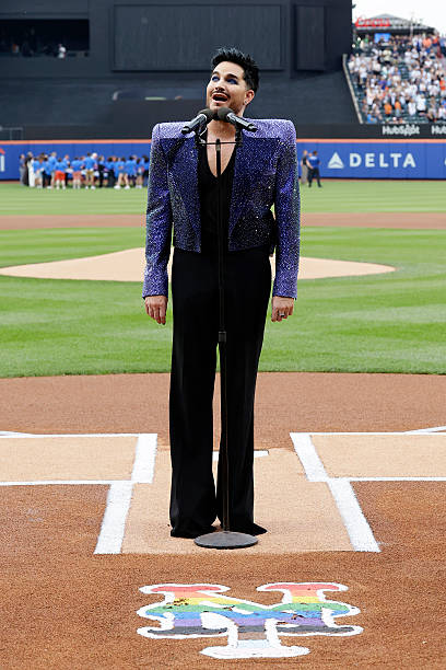 Singer Adam Lambert sings the national anthem before a game between the New York Mets and the Philadelphia Phillies at Citi Field on June 26, 2026 in...