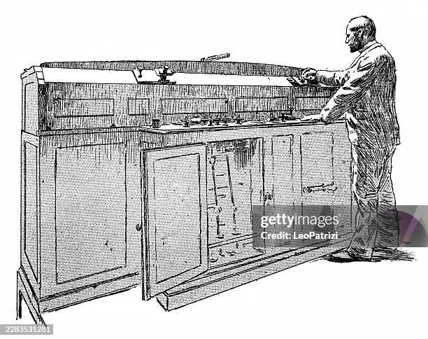 scientist calibrating metrological standards using a large universal comparator apparatus - precision manufacturing stock illustrations