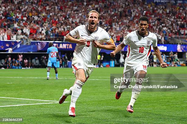 Harry Kane of England celebrates scoring a goal to make the score 1-1 with Jude Bellingham during the FIFA World Cup 2026 Round of 32 match between...