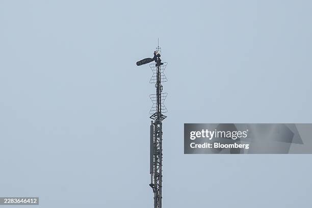 People unfurl a banner from the spire of the Empire State Building in New York, US, on Wednesday, July 1, 2026. Two people got to the top of the...