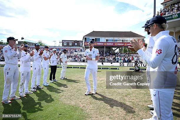 England captain Ben Stokes is is given a guard of honour as he walks out for the final session after announcing his international retirement during...