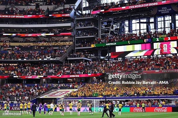 Dejected players of Australia acknowledge their fans after losing the penalty shoot out during the FIFA World Cup 2026 Round Of 32 match between...