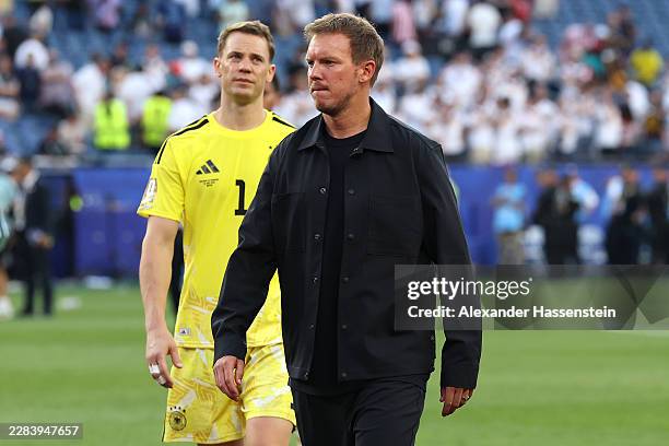 Julian Nagelsmann, Head Coach of Germany, reacts with his keeper Manuel Neuer after the penalty shootout loss during the FIFA World Cup 2026 Round Of...
