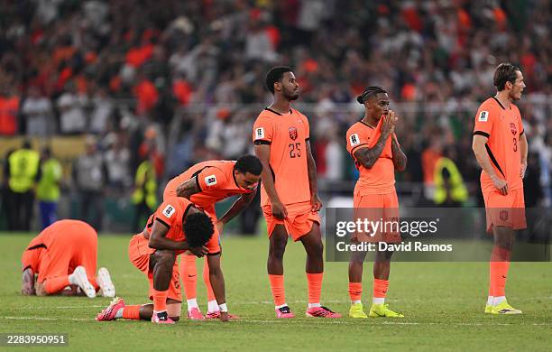 Players of the Netherlands show dejection after their defeat through the penalty shootout during the FIFA World Cup 2026 Round of 32 match between...