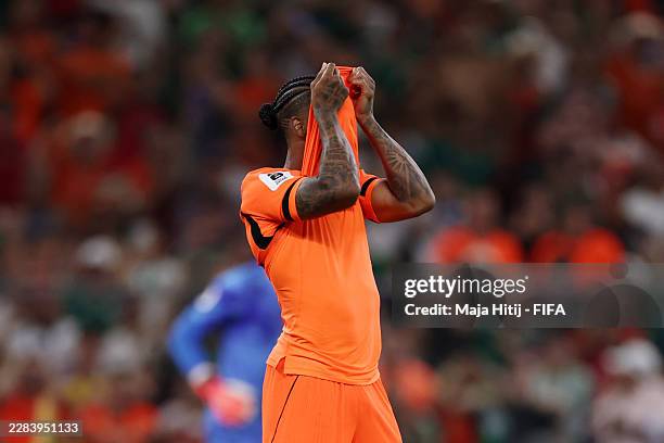 Crysencio Summerville of the Netherlands shows dejection after the team's fifth penalty is saved by Yassine Bounou of Morocco during the penalty...