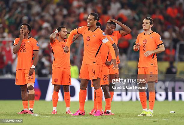 Virgil van Dijk and players of the Netherlands show dejection after their defeat through the penalty shootout during the FIFA World Cup 2026 Round of...