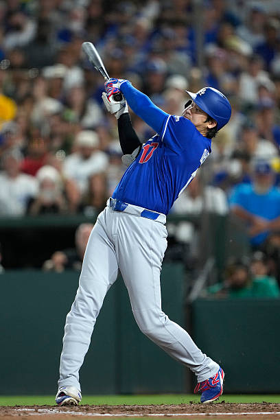 Shohei Ohtani of the Los Angeles Dodgers hits a single against the Athletics in the top of the eighth inning\ at Sutter Health Park on June 29, 2026...
