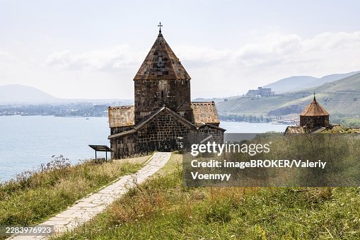 Path to churches in Sevanavank Sevan Monastery, Armenia on sunny summer day on top of Sevan Peninsula Path to churches in Sevanavank Sevan Monastery, Armenia on sunny summer day on top of Sevan Peninsula