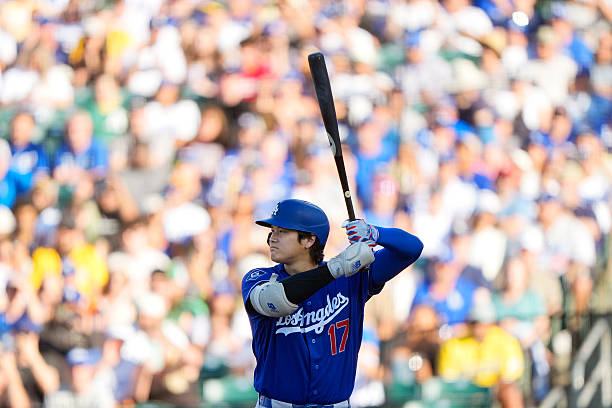 Shohei Ohtani of the Los Angeles Dodgers bats against the Athletics in the top of the first inning of a major league baseball game at Sutter Health...