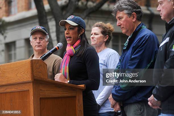 View of Texas State Representative Dawnna Dukes speaks from a lectern, during a rally before the Austin Martin Luther King Jr Day Community March, on...