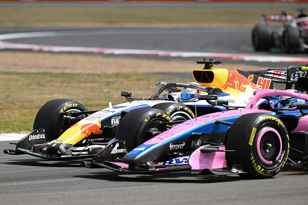 Arvid Lindblad of the United Kingdom and Visa Cash App Racing Bulls Formula One Team competes with Franco Colapinto of BWT Alpine Formula One Team...