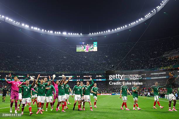 Players of Mexico celebrate after the team's victory and progression to the Round of 16 after the FIFA World Cup 2026 Round Of 32 match between...