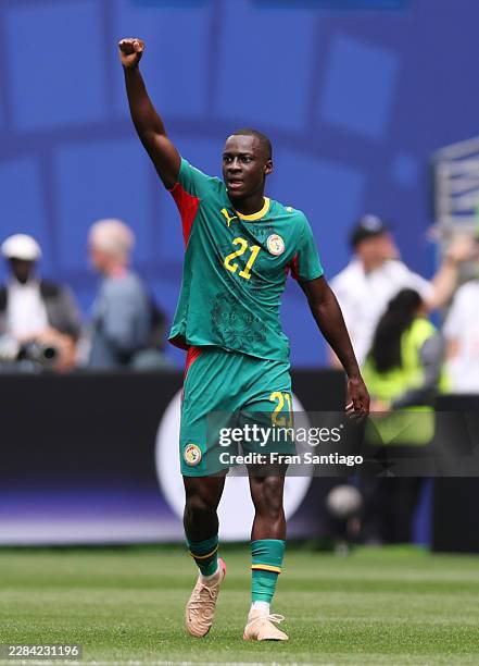 Habib Diarra of Senegal celebrates scoring his team's first goal during the FIFA World Cup 2026 Round Of 32 match between Belgium and Senegal at...