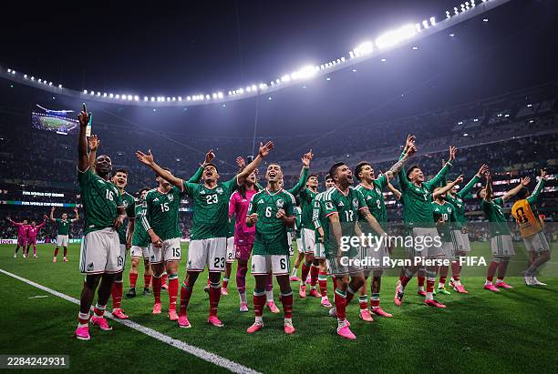 Players of Mexico celebrate after the team's victory and progression to the Round of 16 after the FIFA World Cup 2026 Round Of 32 match between...