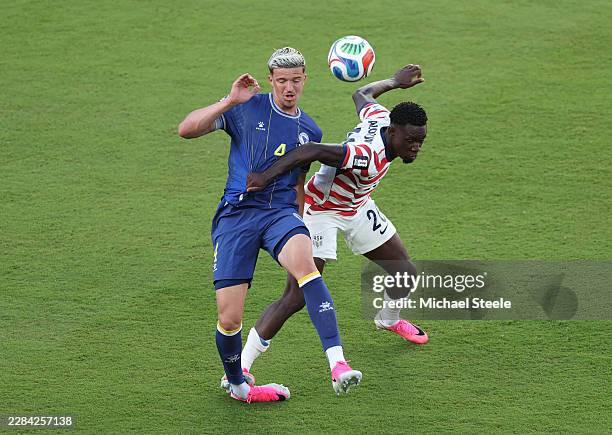 Folarin Balogun of the United States fouls Tarik Muharemovic of Bosnia and Herzegovina which is later reviewed by VAR and awarded as a red card foul...