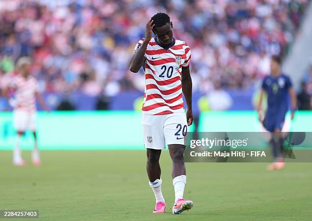 Folarin Balogun of the United States reacts to receiving a red card for a foul on Tarik Muharemovic of Bosnia and Herzegovina during the FIFA World...