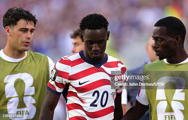 Folarin Balogun of the United States reacts to receiving a red card for a foul on Tarik Muharemovic of Bosnia and Herzegovina during the FIFA World...