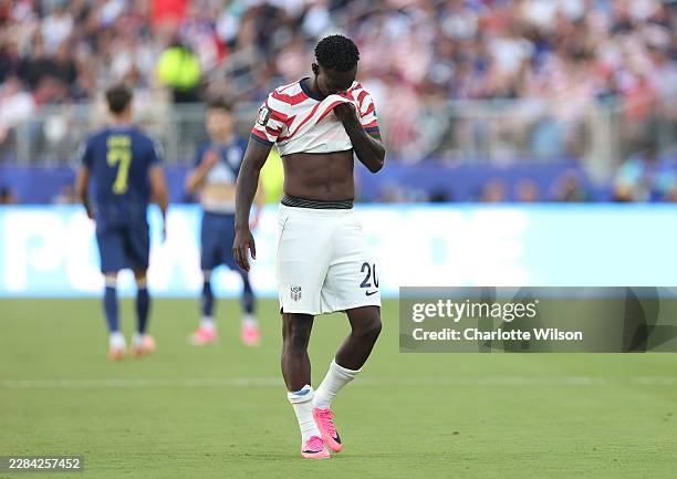 Folarin Balogun of the United States reacts to receiving a red card for a foul on Tarik Muharemovic of Bosnia and Herzegovina during the FIFA World...