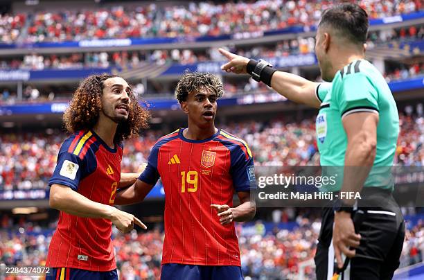 Marc Cucurella and Lamine Yamal of Spain protest to Referee Glenn Nyberg after the team's first goal was disallowed during the FIFA World Cup 2026...