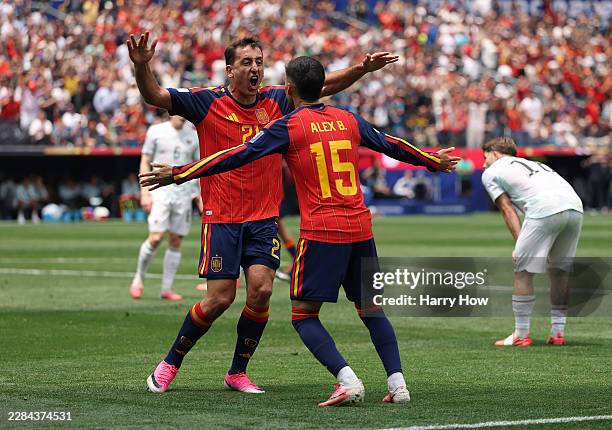 Mikel Oyarzabal of Spain celebrates with Alex Baena after scoring his team’s first goal during the FIFA World Cup 2026 Round of 32 match between...