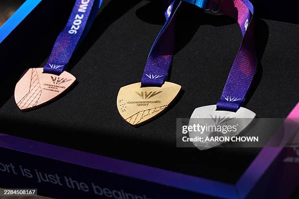 Commonwealth Games medals are displayed during a visit by Britain's Prince William, Prince of Wales to the Ysgol Gymraeg Llundain in Hanwell, West...