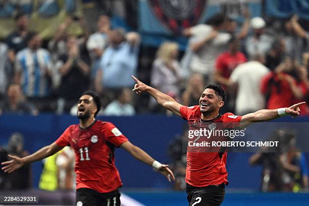Egypt's defender Yasser Ibrahim celebrates scoring his team's first goal during the 2026 World Cup round of 16 football match between Argentina and...