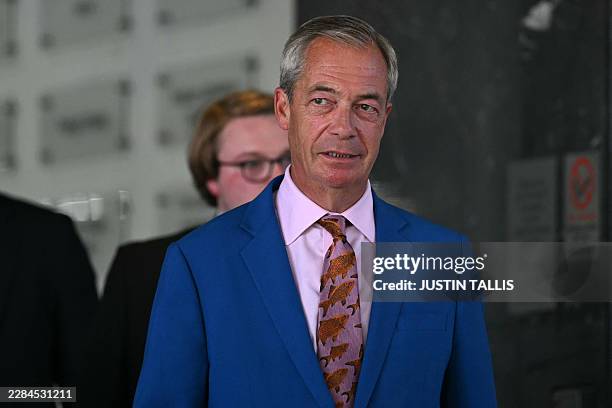 Reform UK Leader Nigel Farage leaves from Millbank Tower after making a televised speech in which he resigned as MP for Clacton, in central London on...