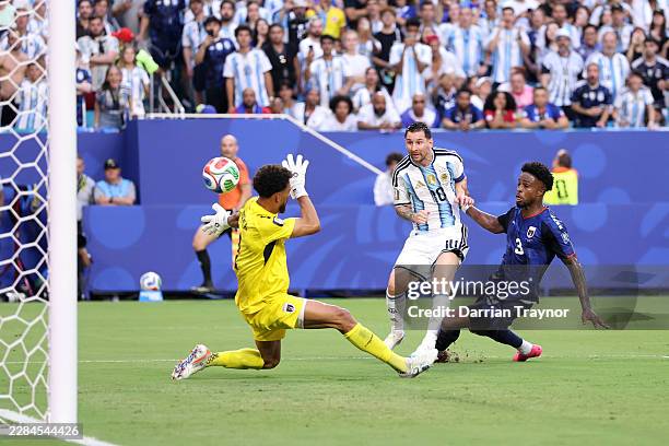 Lionel Messi of Argentina scores his team's first goal during the FIFA World Cup 2026 Round of 32 match between Argentina and Cabo Verde at Miami...