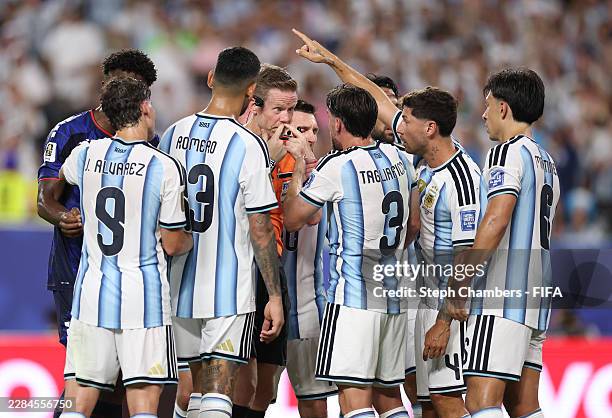 Argentina players argue with referee Drew Fischer during the FIFA World Cup 2026 Round of 32 match between Argentina and Cabo Verde at Miami Stadium...