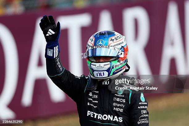 Pole position qualifier Andrea Kimi Antonelli of Italy and Mercedes AMG Petronas F1 Team celebrates on arrival in parc ferme during qualifying ahead...