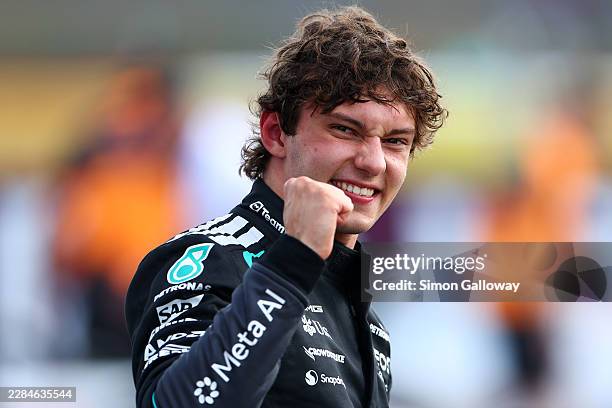 Pole position qualifier Andrea Kimi Antonelli of Italy and Mercedes AMG Petronas F1 Team celebrates in parc ferme during qualifying ahead of the F1...