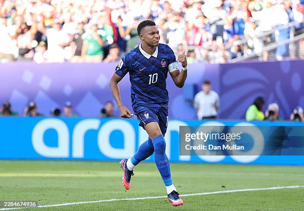Kylian Mbappe of France celebrates scoring a penalty for the team's first goal during the FIFA World Cup 2026 Round of 16 match between Paraguay and...