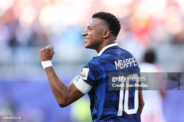 Kylian Mbappe of France celebrates scoring a penalty for the team's first goal during the FIFA World Cup 2026 Round of 16 match between Paraguay and...