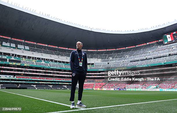 Thomas Tuchel, Manager of England, looks on as he inspects the pitch at the Mexico City Stadium on July 04, 2026 in Mexico City, Mexico.