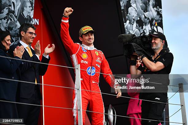 Race winner Charles Leclerc of Monaco and Scuderia Ferrari celebrates on the podium during the F1 Grand Prix of Great Britain at Silverstone Circuit...