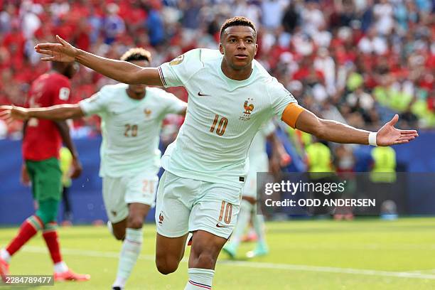 France's forward Kylian Mbappe celebrates scoring his team's first goal during the 2026 World Cup football tournament quarter-final match between...