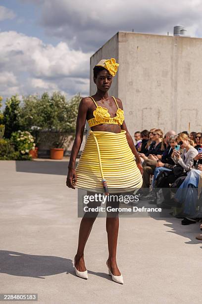 Model walks the runway at the Marie-Louise Müller fashion show during the Berlin Fashion Week Spring/Summer 2027 at Lobe Block on July 5, 2026 in...