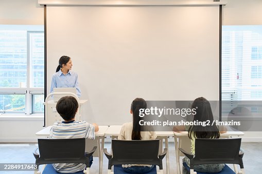 Academy instructor, during class, beam projector Academy instructor, during class, beam projector