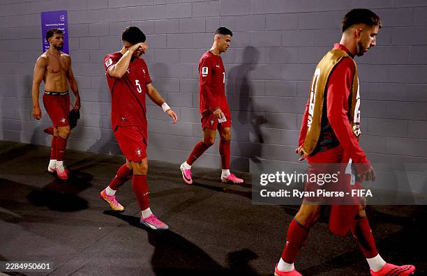 Cristiano Ronaldo of Portugal and teammates walk back to the dressing room after the team's 0-1 defeat in the FIFA World Cup 2026 Round of 16 match...