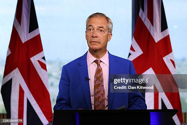 Reform UK Leader Nigel Farage announces his resignation as a member of parliament while giving a statement on his "future in public life" at Millbank...
