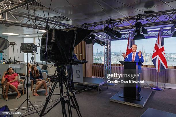 Reform UK Councillor Laila Cunningham and Suella Braverman listen as Reform UK Leader Nigel Farage announces his resignation as a member of...