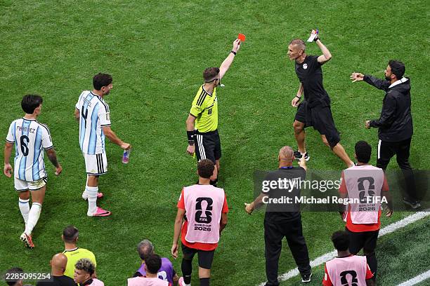 Referee Francois Letexier shows a red card to team official Saafan Elsaghir of Egypt during the FIFA World Cup 2026 Round of 16 match between...
