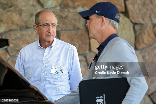 Chairman and Co-CEO of Comcast Brian Roberts and President and Co-CEO of Comcast Corporation Mike Cavanagh arrive at the Sun Valley Lodge for the...