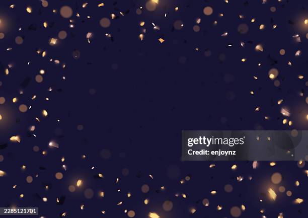 golden confetti frame on dark background - glitter falling stock illustrations