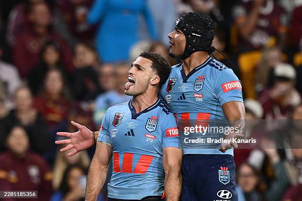 Nathan Cleary of the Blues celebrates scoring his second try during game three of the Men's State of Origin series between the Queensland Maroons and...