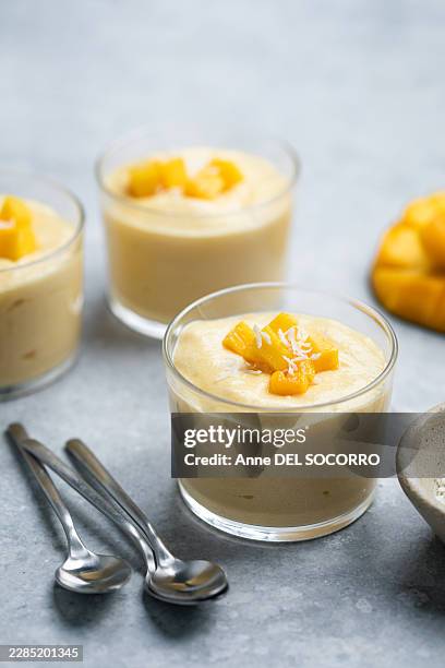 fresh mango mousse with coconut - mango mousse stock pictures, royalty-free photos & images