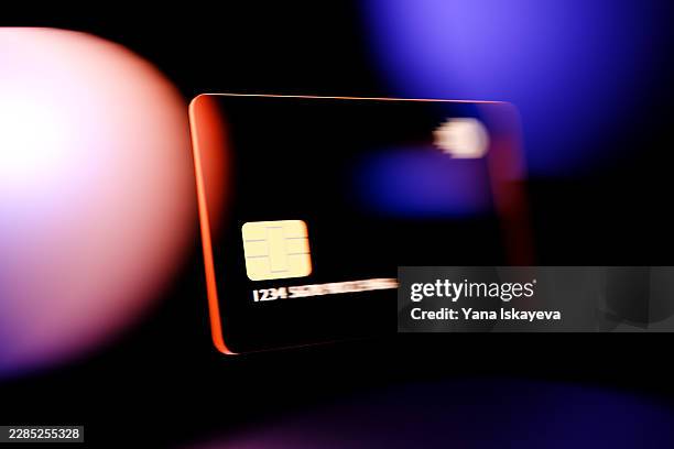 futuristic digital payment card with abstract fintech background, transparent glass design - token stock pictures, royalty-free photos & images