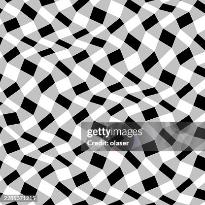Black and white wavy checkered pattern creating a distorted geometric surface with strong contrast and flowing movement. Black and white wavy checkered pattern creating a distorted geometric surface with strong contrast and flowing movement.